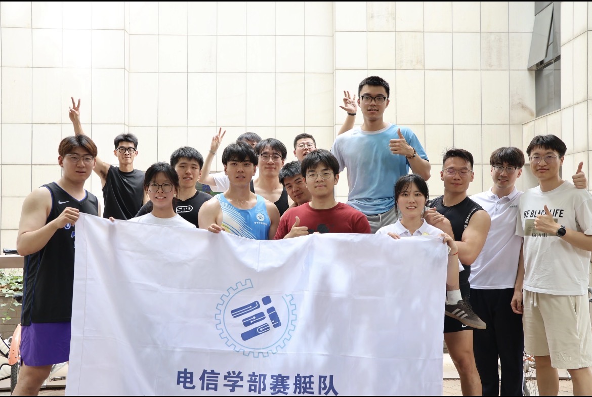 A group photo of the rowing team.